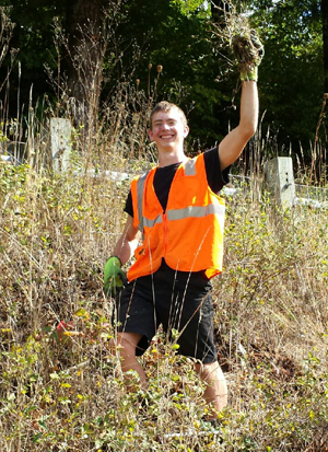 Isiah holds up Knapweed during his first Weed Pull adventure!