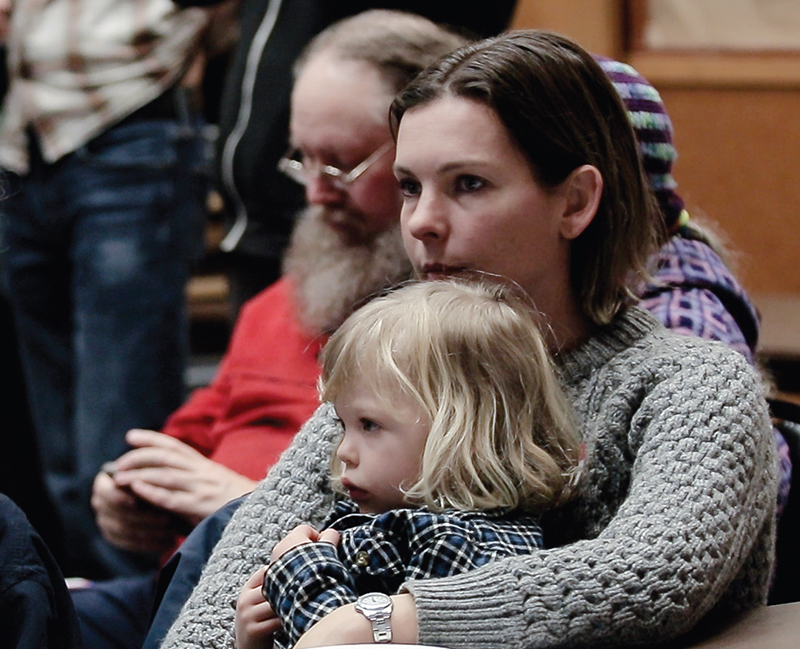 Bethel neighbor listens to a West Eugene clean air presentation.