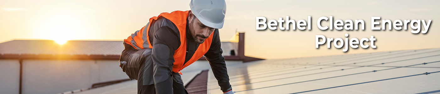 Read the Beyond Toxics materials on Regenerative Ecosystems A worker is fixing solar panels on the roof.