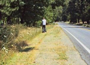 Jeb_push_mowing_CedarFlatRd_WilliamsMowDay-300x217