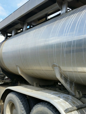 Herbicides leak out of an Applebee truck in Douglas County. Photo by Darryl Ivy.